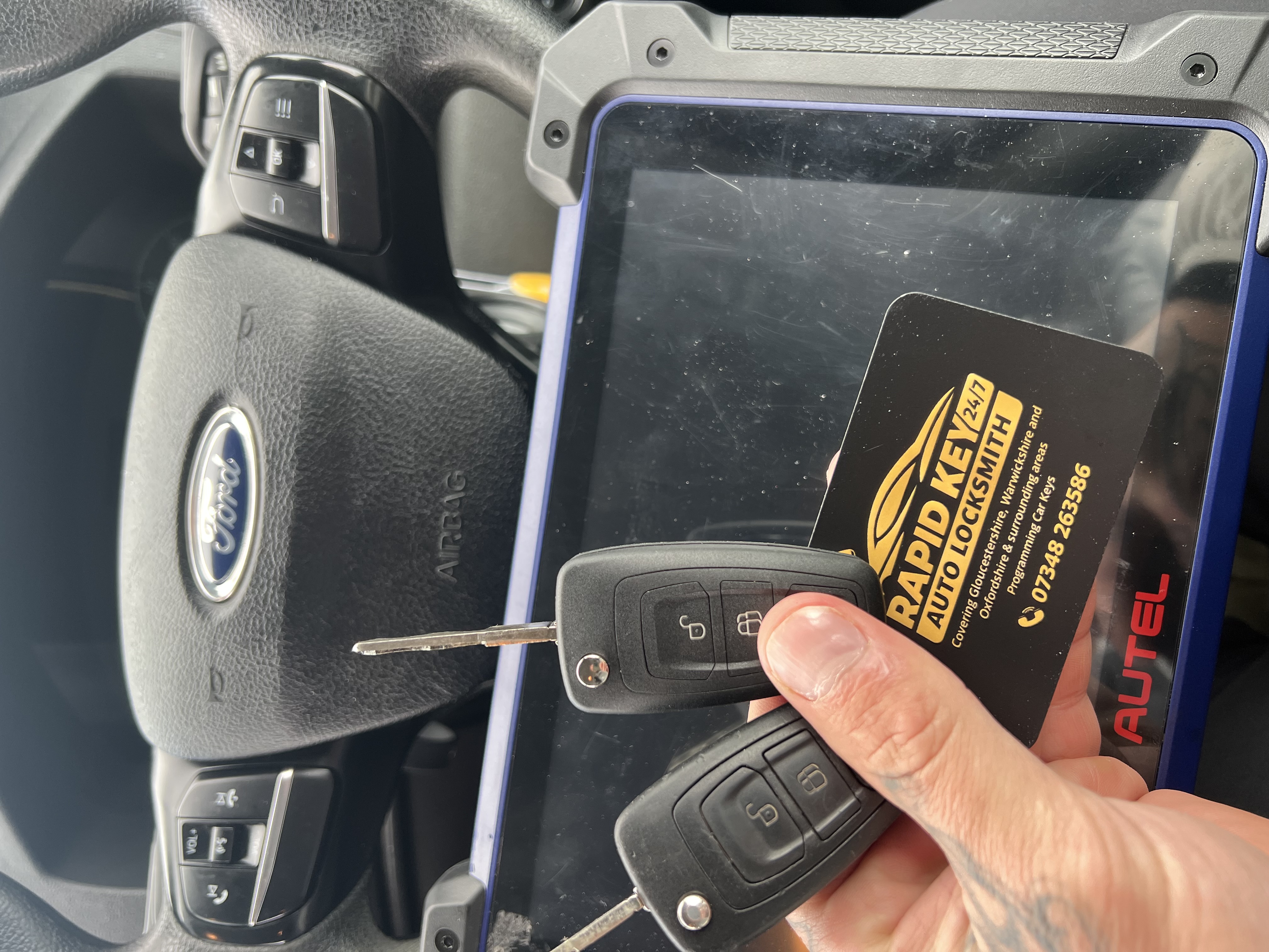 Rapid Key 24/7 mobile auto locksmith on the job